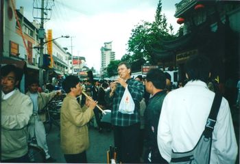 China Tour Jammin' with a street vendor in Shanghai
