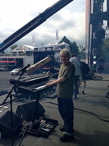 setting up Roger O'Donnell's keyboards for The Cure's Montreal show,
July 2013
