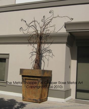 Whimsical Steel Sculpture - Private Commission -  Fulton Mall, Fresno, CA

A collaboration of Eric and Debra Montgomery. www.themetalshoppe.net / www.acopperrose.com
