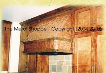 Small Hammered Copper Kitchen Hood with Forged Iron Straps / Location: Fresno, CA
