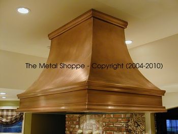 French Curve Welded Copper Island Hood with Custom Welded Copper Molding / Location: Fresno, CA
