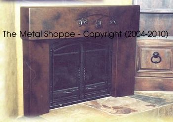 Custom Fabricated Steel Fireplace Mantel with Forged Iron Oak Branch and Faux paint / Location: Fresno, CA
