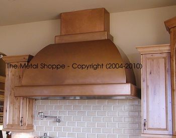 Dome Shape Welded Copper Hood with Telescoping Duct Cover. Welded Copper Trim. Location: Madera, CA
