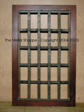 Custom Forged Grill / Door with Wood Frame by others. / Location: Chowchilla, CA
