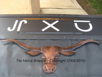 Custom Fabricated Steel and Sheet Metal Fireplace Surround for gas insert. Customized with customer's cattle brands and copper steer head 2 - Copper repousse steer head by A Copper Rose Metal Art
