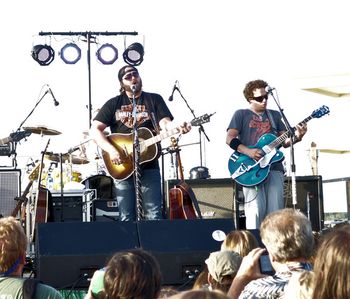 Randy Houser and Chad Warrix on lead guitar on the pier for the opening of the festival.
