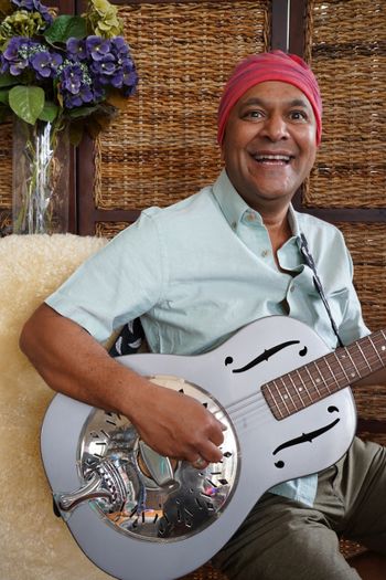 Stan Posing with His Resonator Guitar
