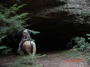 Rock overhangs make these trails just fantastic. I love to ride them. Mike and Wa'te again.
