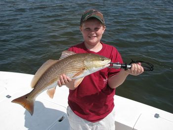 Dylan with 1 of his tournament winning redfish
