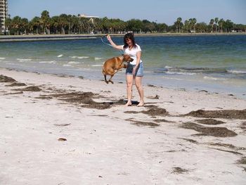 Jumpin for joy at the St. Pete Pier beach 5mo old
