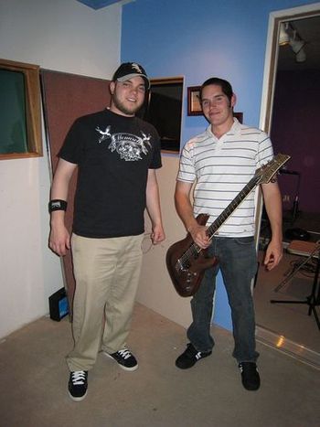 The two guitar players in the band Reverse Affect. They recently started their recording project with us. This picture was taken in the upstairs portion of the studio in one of the iso booths. Thanks for posing for a shot!

