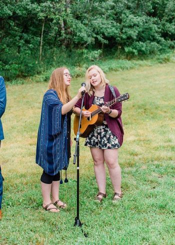 Zoe and Emily Dubois singing for a wedding ceremony in Kenosee Lake.
