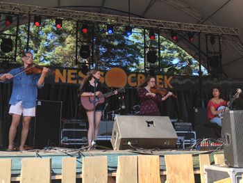 The Trad Music Collective performing as part of the Youth Stage at Ness Creek Music Festival.
