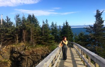 Allison walking the bridge to the Swallowtail Lighthouse.
