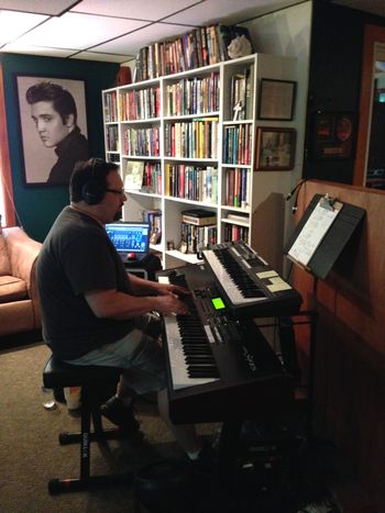 Steve Peffer using his keyboards to add the sounds of piano, Hammond B-3, church organ, and strings.
