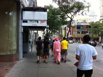 Yes, that's a pink bunny walking down the street...

