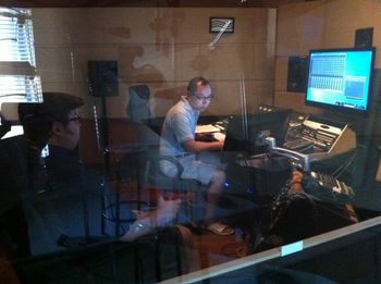 Allison's view from inside the booth of Gerald  & our engineer, Eugene.
