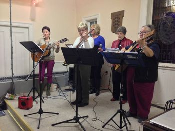 Worship Team from the Roman Catholic Church who came to play at tonight's open mic. Don't know if they have more fun singing or cracking jokes
