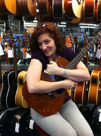 Allison falling in love with a little mahogany Gibson...
