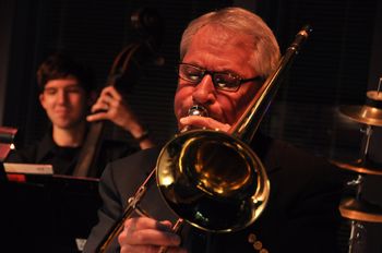 Dan Strom solos on trombone with a contented Zach Beeson in the background!
