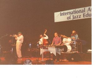 At the International Association of Jazz Educators Conference in Miami: Jazz trumpeter/saxophonist Ira Sullivan's "Art of Improvisation Band" with Tom Toyama vibes, Ron Perillo - piano, Don Miller - bass, Guy Vivarose - drums. Ira would say that Guy was a great drummer because he could burn at a double "p," meaning he could play softly but still keep the groove and intensity happening! It's true!
