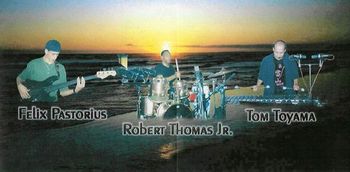 Bermuda Triangle CD inside photo. Robert Thomas Jr. is a unique, creative and incredible percussionist and vocalist. Feliz Pastorius, son of electric bassist Jaco Pastorius, was already a great player in his youth. Performing live with Robert & Felix was a creative and artistic experience that I will never forget. T. Toyama
