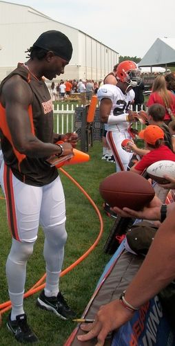 Carlton Mitchell with our cd in his hand at Training Camp 8.2.2012 www.NewBrownsMusic.com
