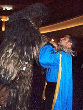 Another Lando-costumer gets choked by a wookie.
