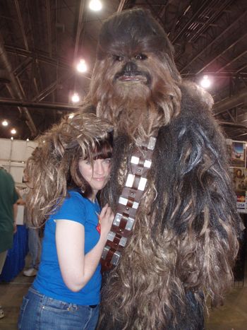 For her sake, lets hope Chewie took a flea bath first.
