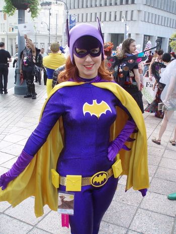 Batgirl looks for Batman.
