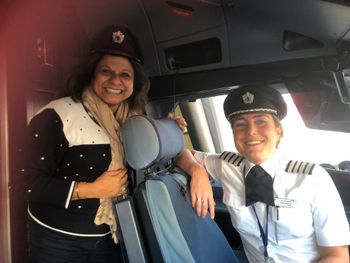 In the Cockpit with BA Pilot - they can be women too! I am wearing the Co-pilot's Cap!
