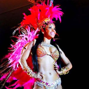 Samba Dancer in a sparkling Brazilian bikini posing on stage