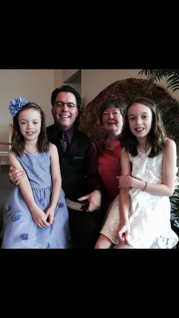 Pastor Phil and his wife Linda and their Grands.

