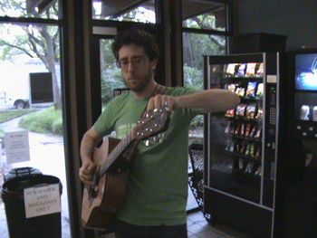 DB changin' strings in the break room @ KGSR 107.1
