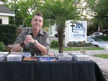 Sitting at the Sales table after the concert at Joy MCC
