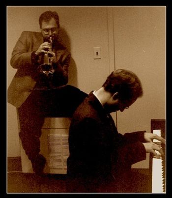 Dmitri Matheny and George Colligan warm up backstage before the concert.
