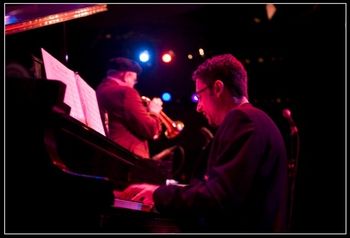 YOSHI'S A beautiful "Audience POV" Scott Chernis photo of pianist Matthew Clark, with Dmitri Matheny in the background.
