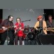 Liverpool guitarist John with Moody Blues/Wings guitarist Denny Laine, Mark Hudson & Billy Joel saxman Mark Rivera
