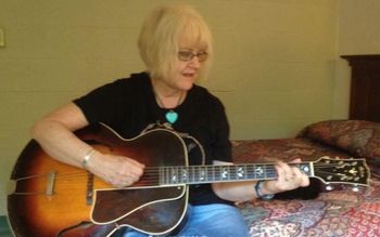 Playing Maybelle, Gibson L7 in my room at Augusta Heritage Music Camp
