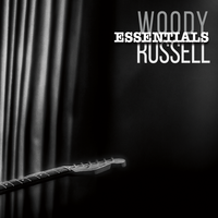 Essentials - Autographed by Woody Russell  