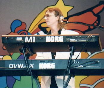 George plays with Herman's Hermits at Epcot Center in Orlando, Florida
