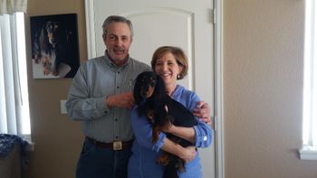 Rocky and his forever mommy and daddy!  It is a blessing to see how much they love and care for him!
