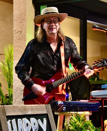 George DeJong and his Red Guitar
