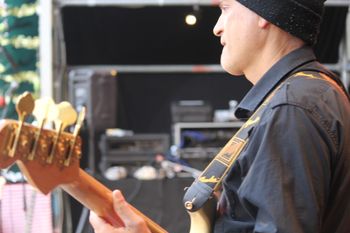 Pat on Bass playing for Pulse at Paisley Stage
