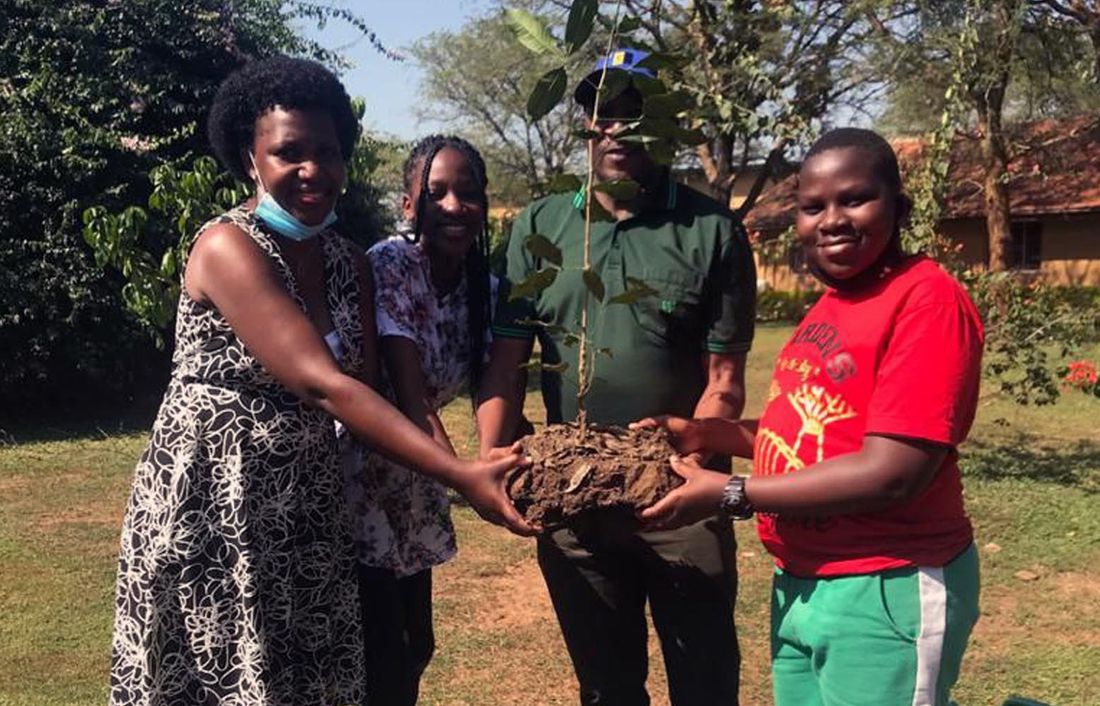 The Ssekaana Family Planting a Tree at Murchison Falls Park
