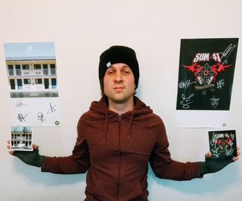 With signed band merch from Bayside and Sum 41
