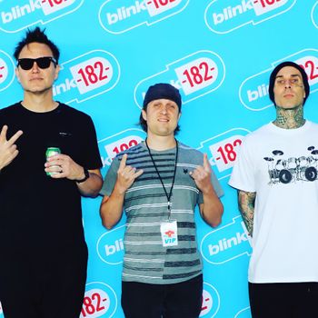 With Mark Hoppus and Travis Barker from Blink
