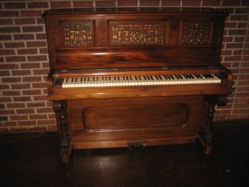 1880 Fischer Antique Upright in original un-restored condition except for the key tops. That We Proudly Donated to Millworks Theatre in Lebanon TN.
