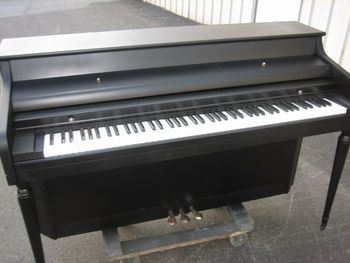 1976 Kimball after receiving a new satin black finish, a new lyre was added after delivery.
