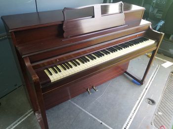 1957 Whitney Console, Merlot color, matching bench, recently serviced, sounds good, matching bench. 700.00 Delivered, tuned, warranty.
